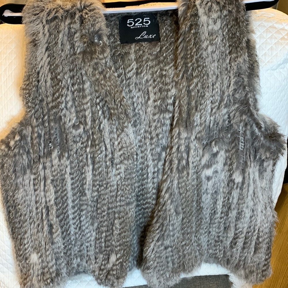 FAUX fur luxe vest light grey color. Great condition